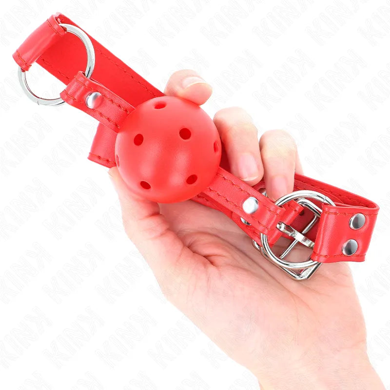 Bâillon boule silicone rouge avec sangles ajustables, design confortable et hypoallergénique pour sessions BDSM.