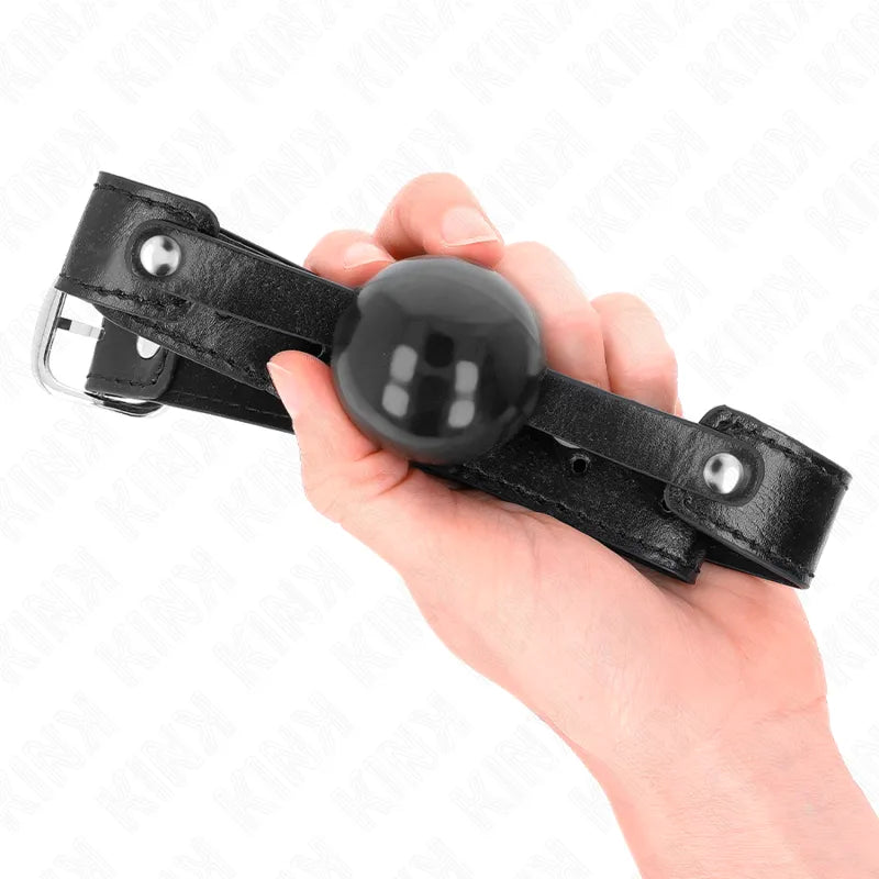 Gag silicone noir ajustable, ergonomique, hypoallergénique, avec sangle en cuir, pour confort et sécurité BDSM.