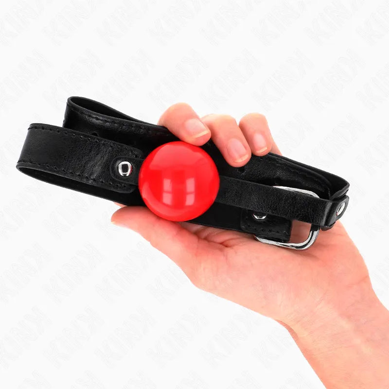 Bâillon BDSM silicone rouge vibrant avec sangles noires ajustables, confortable et sécurisant pour débutants et experts.