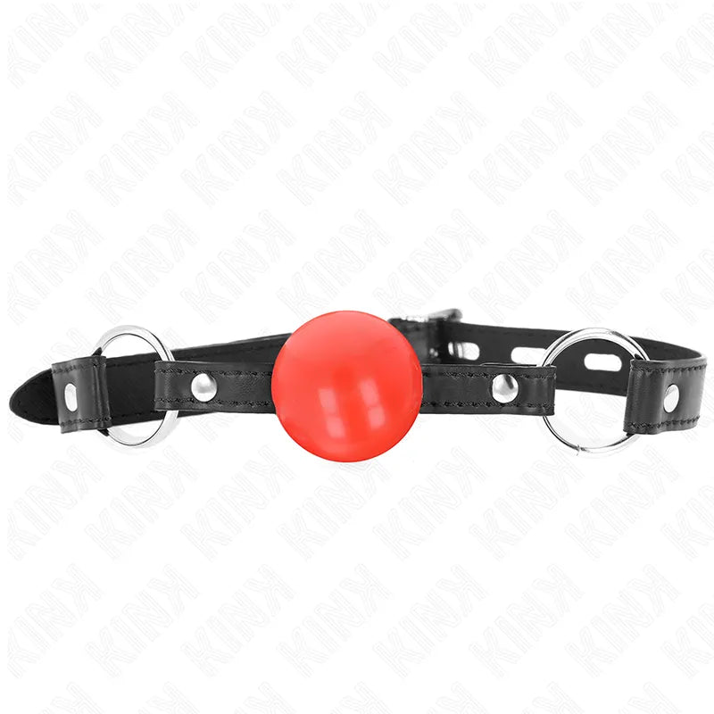 Gag BDSM en silicone rouge, ergonomique, avec sangle noire réglable et anneaux métalliques, confortable et discret.
