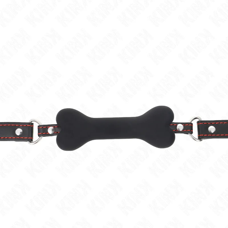 Gag BDSM en silicone noir, forme os, avec sangle réglable rouge et noire, pour jeux de soumission sécurisés.