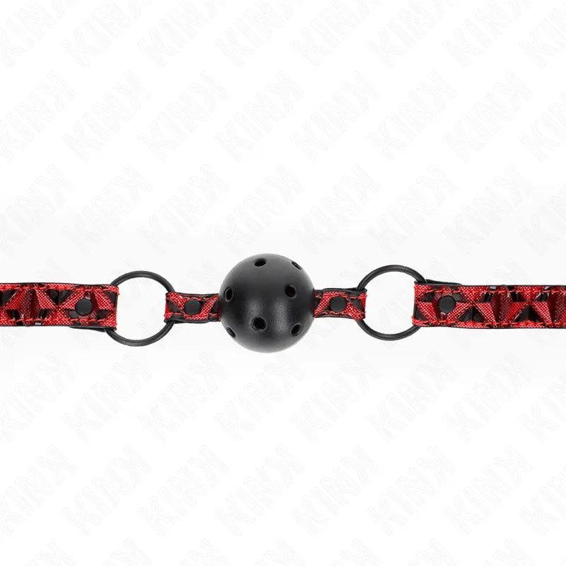 Gag BDSM en silicone noir avec sangle rouge ajustable, design ergonomique, modèle boule, confortable et discret.