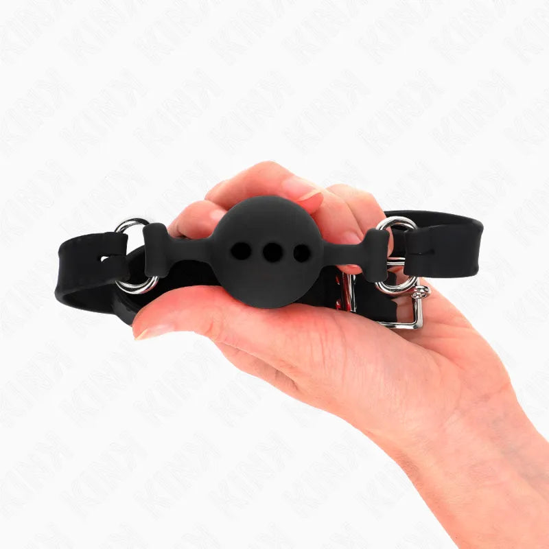 Gag en silicone noir ajustable avec bretelles ergonomiques et hypoallergéniques, idéal pour confort BDSM.