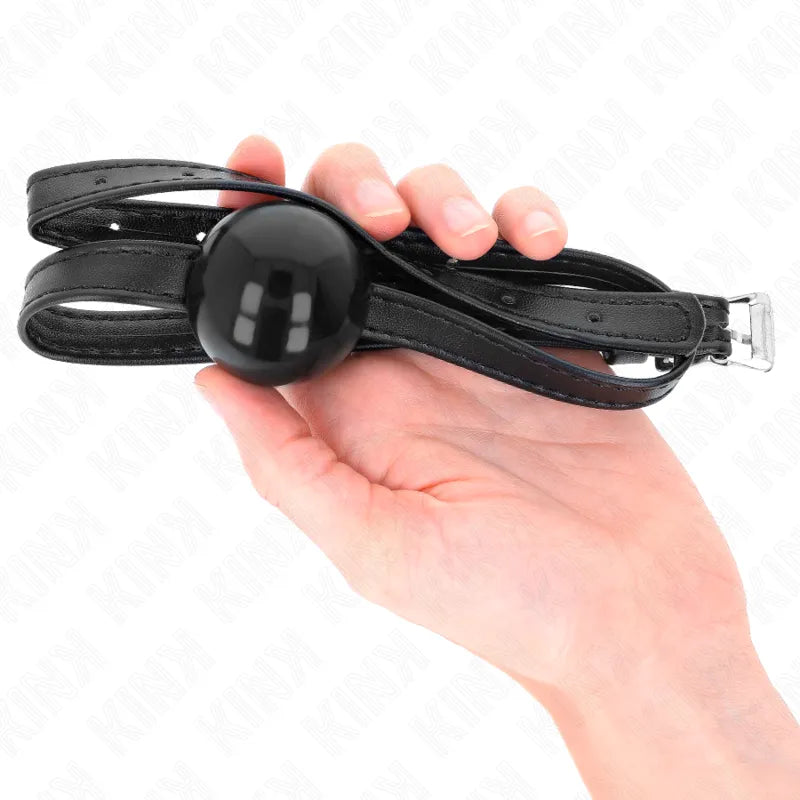 Gag BDSM noir en silicone médical avec sangle ajustable, design élégant pour confort et sécurité, adapté débutants et expe...