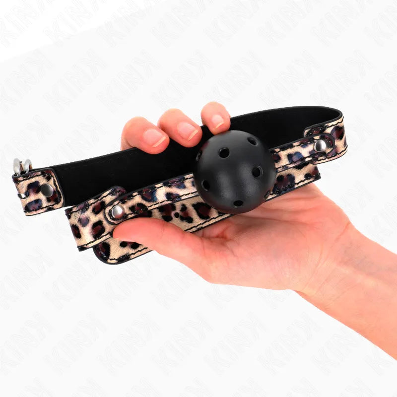 Gag BDSM en silicone noir avec sangles réglables motif léopard, ergonomique et hypoallergénique pour débutants.