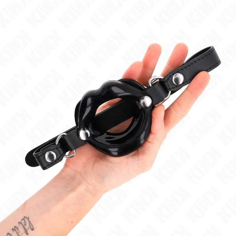 Bâillon BDSM silicone noir, ajustable, ergonomique, avec cerceau et sangle en cuir, pour confort et hygiène optimale.