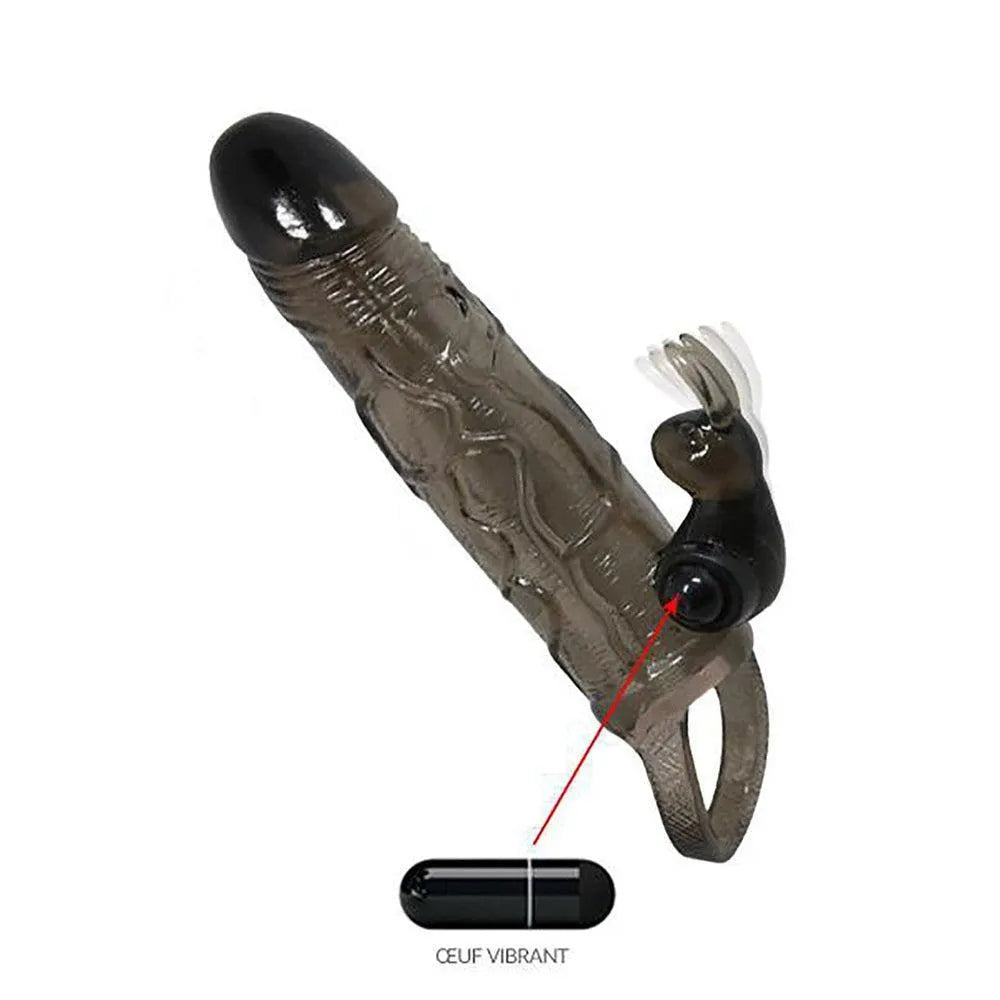 Gaine pénis vibrante noire avec stimulation gland, clitoris et ergot anal, vibrations réglables, matériau souple.