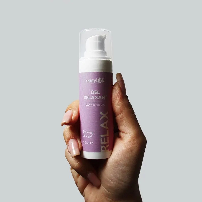 Flacon de gel anal relaxant violet, pompe blanche, 50 ml, ingrédients naturels, massage intime, fabriqué en France.