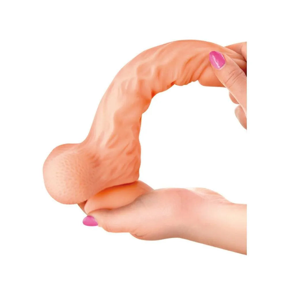 Gode ventouse réaliste beige avec veines apparentes et testicules, texture souple, fixation puissante pour surfaces lisses.