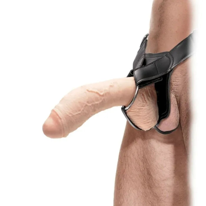 Gode ceinture creux en caoutchouc beige avec harnais cuir noir ajustable, longueur 25 cm, largeur 6 cm, tube intérieur 3 cm.