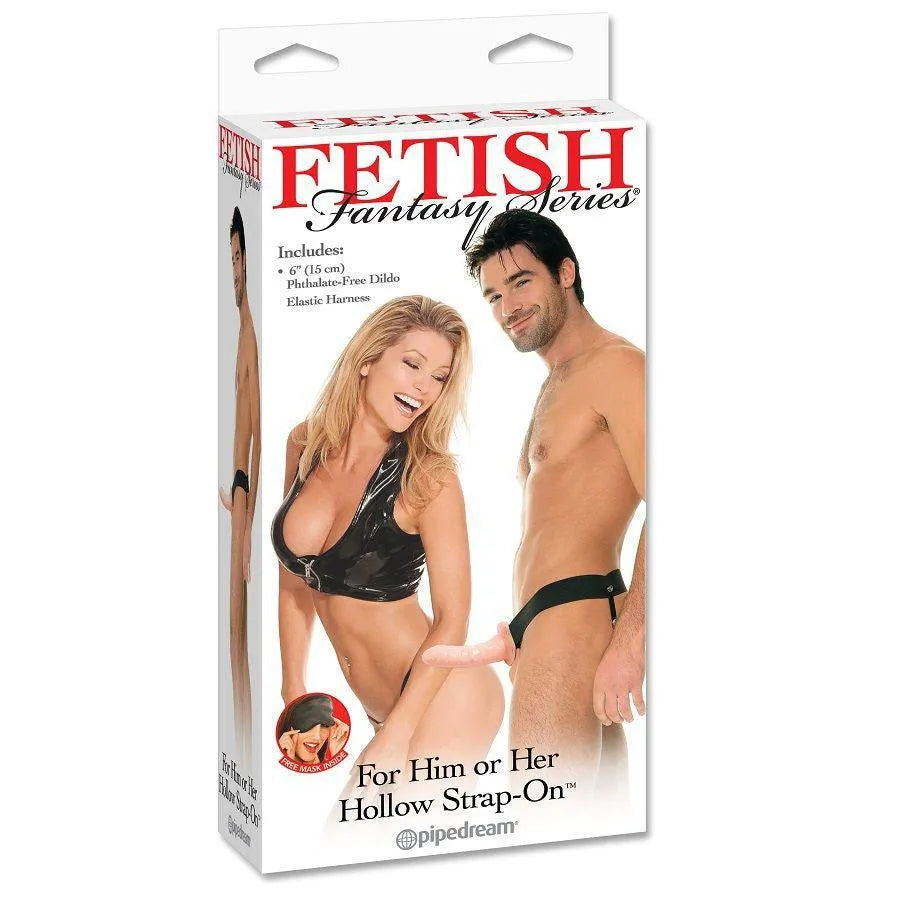 Gode-ceinture creux silicone noir 15cm, harnais élastique réglable, masque satin inclus, emballage Fetish Fantasy.