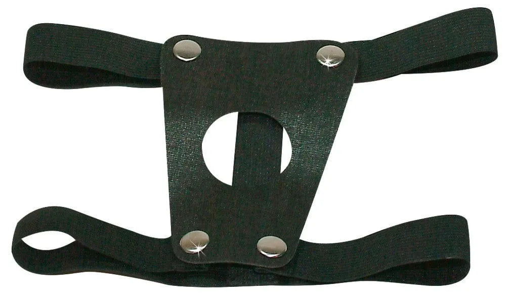 Harnais gode ceinture creux PVC noir, lanières élastiques ajustables, profondeur 16,5 cm, diamètre intérieur 4 cm.