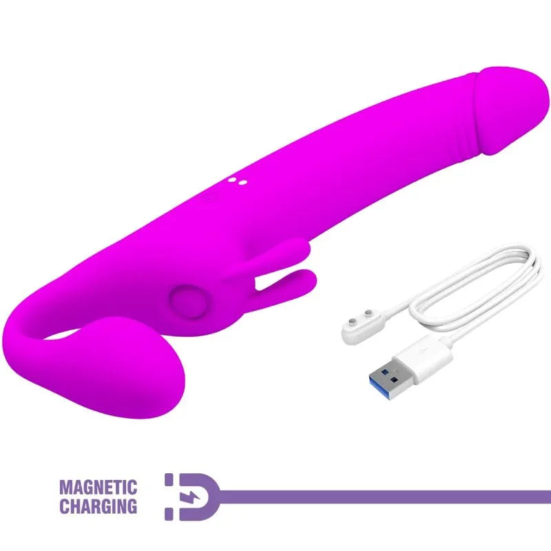 Gode-ceinture vibrant sans bretelles en silicone rose, rechargeable magnétiquement, ergonomique, avec câble USB inclus.