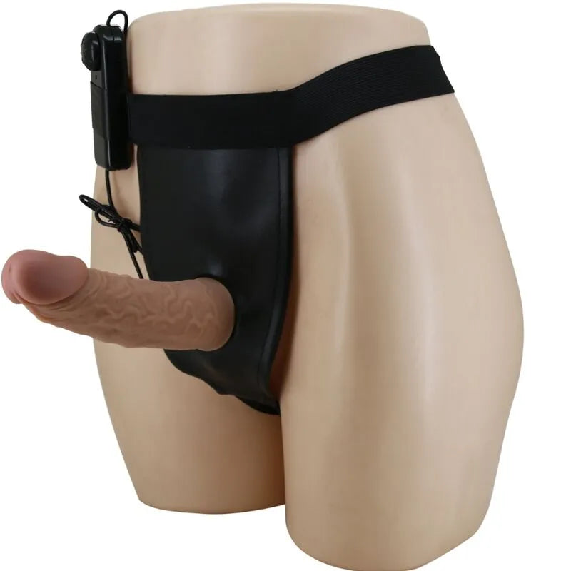 Gode ceinture vibrant marron en silicone, harnais noir réglable, design ergonomique et imperméable pour plaisir optimal.