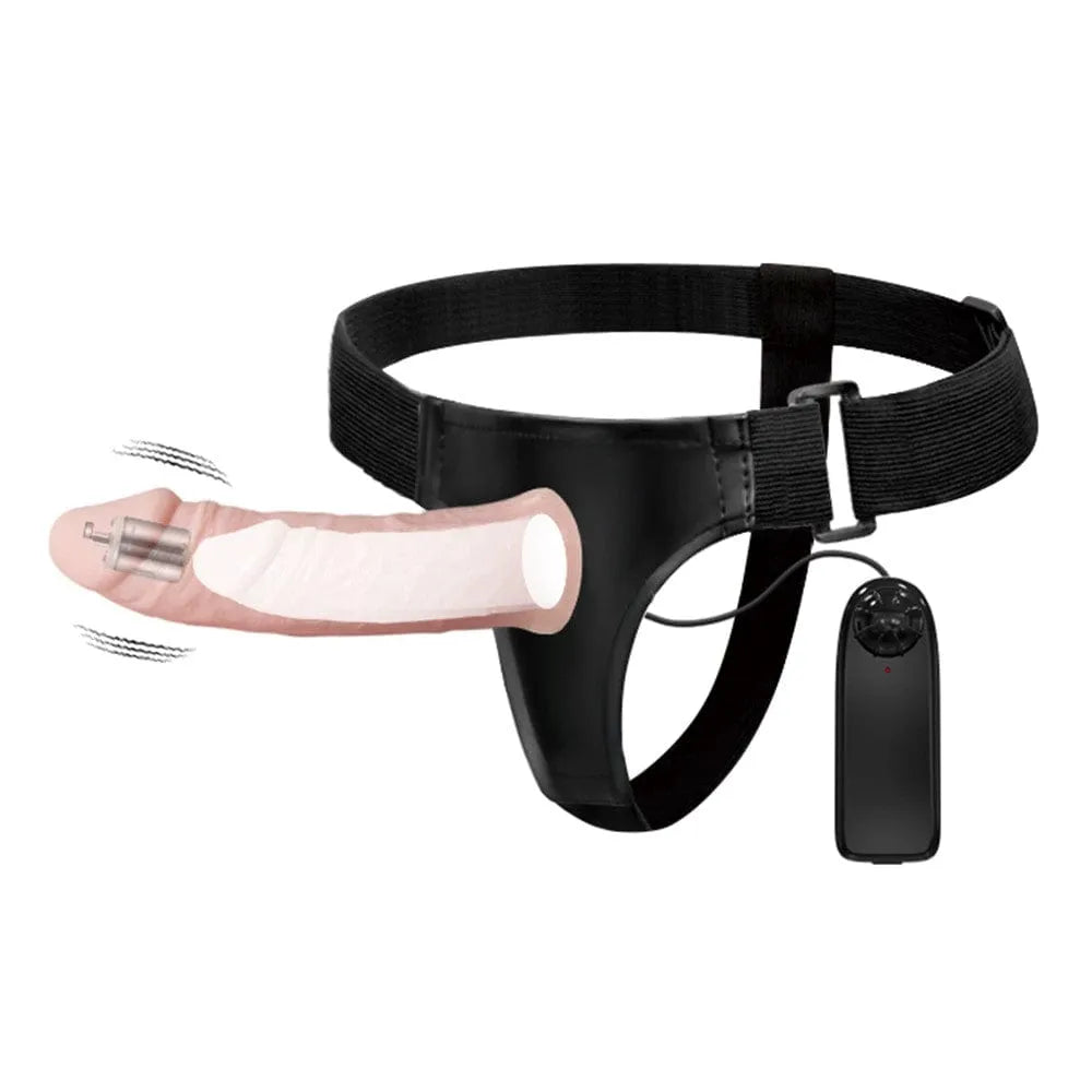 Gode ceinture vibrante rose avec harnais noir ajustable et télécommande, design ergonomique et discret.