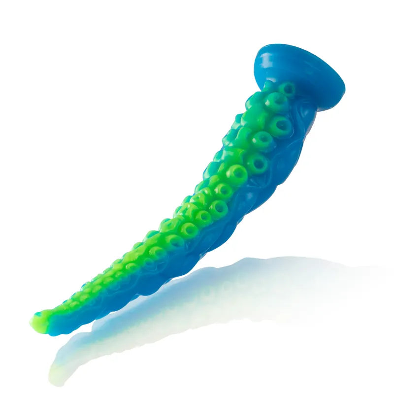 Gode silicone bleu-vert inspiré mythologie grecque, forme ergonomique, pointe fine, base stable, texture tentaculaire.