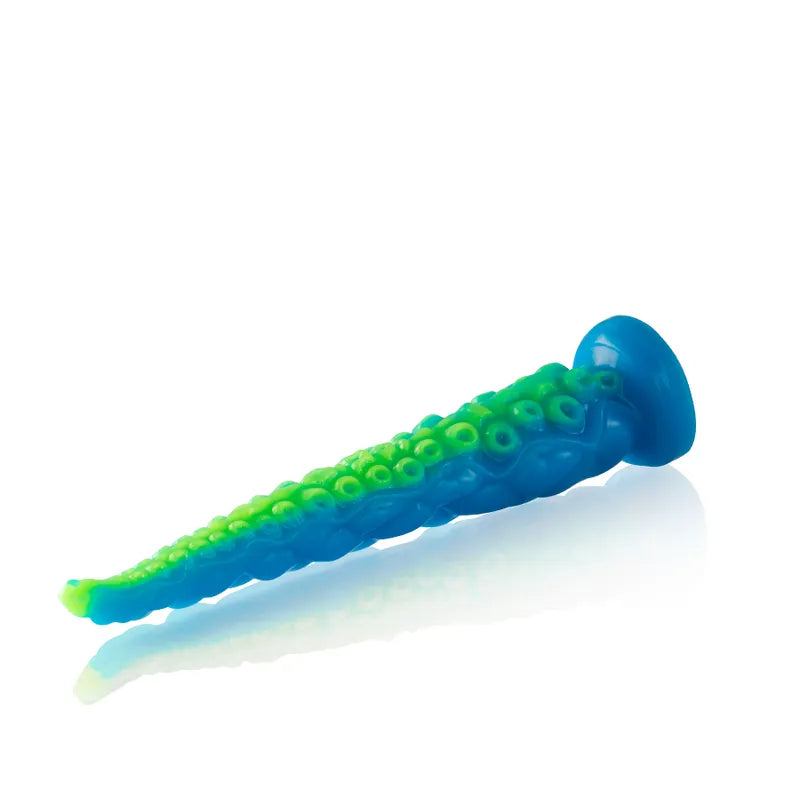 Gode silicone bleu et vert, inspiré mythologie grecque, forme conique avec base stable, design ergonomique et esthétique.