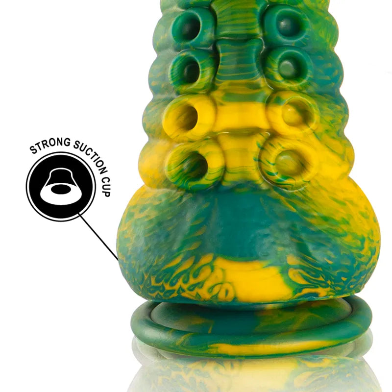 Gode en silicone mythologique vert et jaune, texturé, ventouse puissante, design inspiré des dieux grecs, étanche.