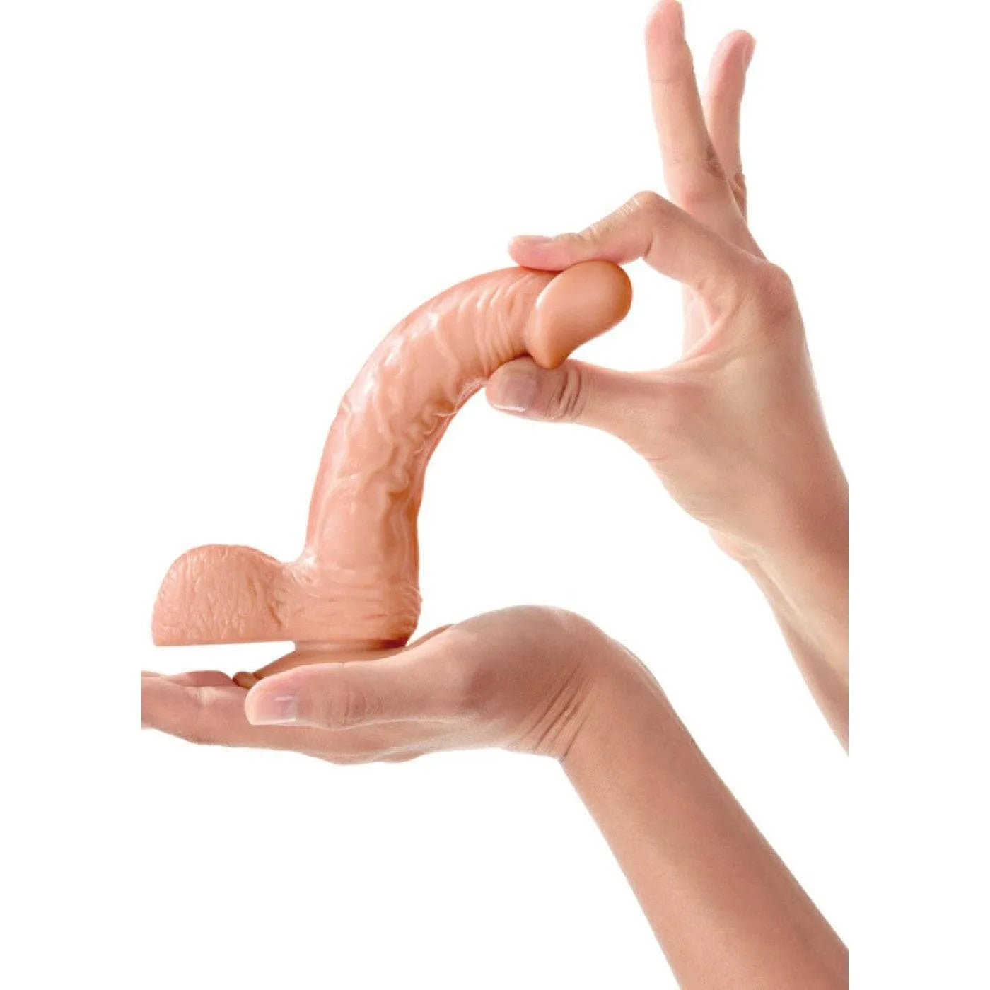 Gode réaliste silicone beige avec ventouse et testicules, 18cm, fixation mains libres, sans phtalates, surface texturée.
