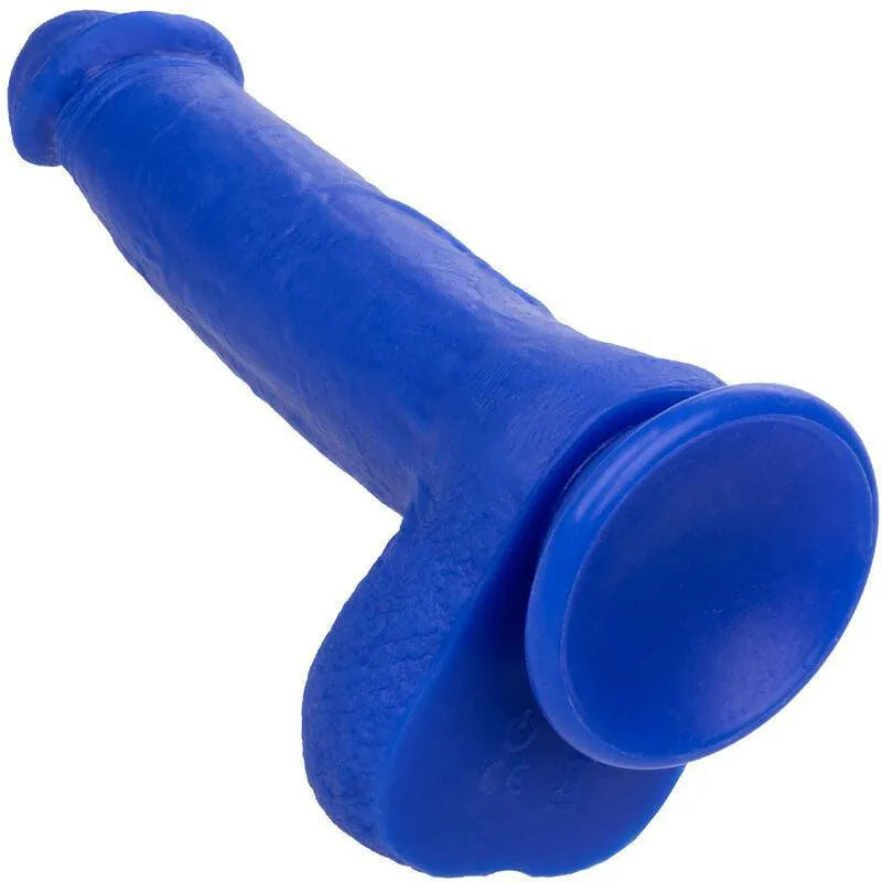 Gode vibrant bleu en silicone liquide avec ventouse, texture réaliste, étanche IPX7, pour plaisir mains libres.