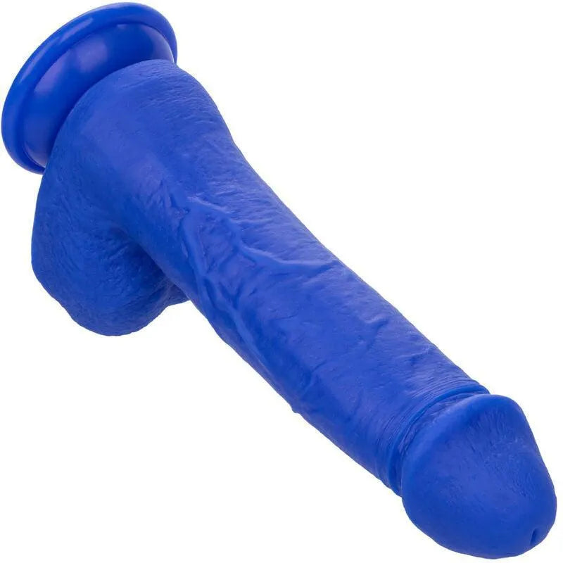 Gode vibrant bleu en silicone liquide avec ventouse, texture réaliste, étanche IPX7, pour plaisir mains libres.