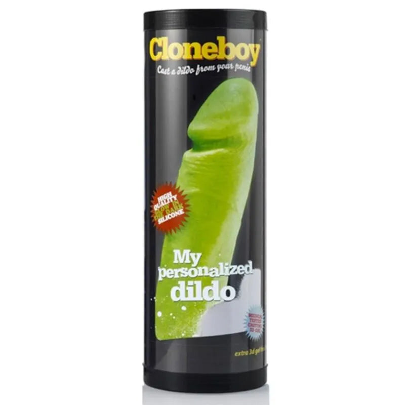 Godemichet phosphorescent vert en silicone médical, courbé et ergonomique, dans un emballage noir personnalisé.