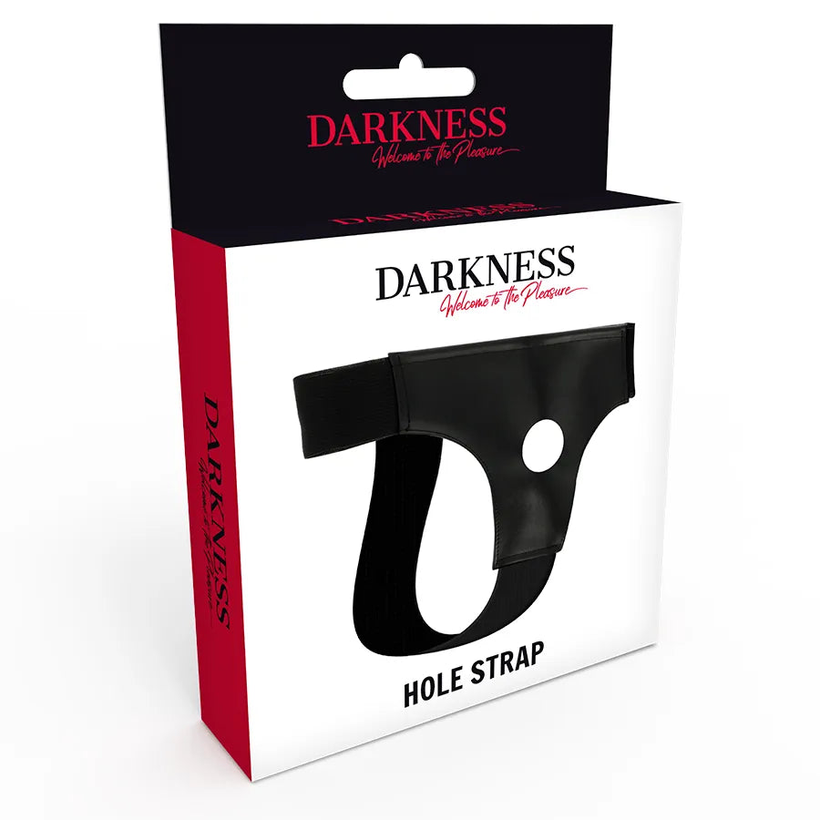 Harnais BDSM noir en cuir PU, extensible, avec trou 35mm pour gode, sur emballage rouge et blanc, taille unique.