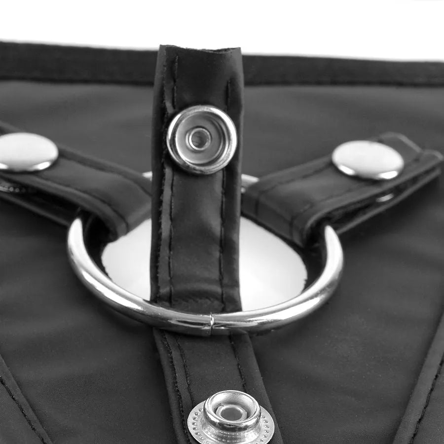 Harnais noir en nylon avec anneau torique, boutons pression métalliques, bretelles réglables, idéal débutants.