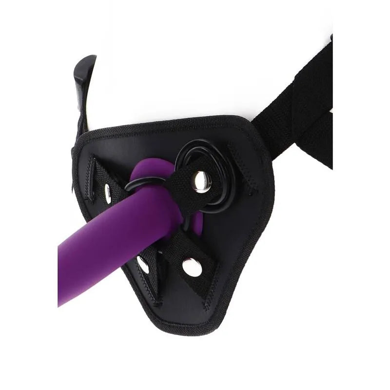 Harnais noir avec coussin rembourré, anneaux en silicone ajustables, bretelles réglables, pochette vibrante intégrée.