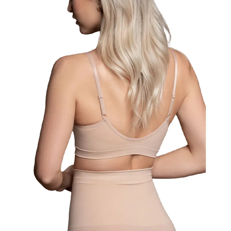 Soutien-gorge beige sans couture, contrôle moyen, bretelles ajustables, confort optimal, met en valeur la silhouette.