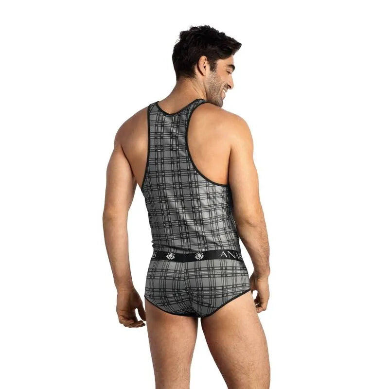 Homme portant un haut sans manches à carreaux noir, gris, blanc, en microfibre, ajusté, élégant, fabriqué en Europe.
