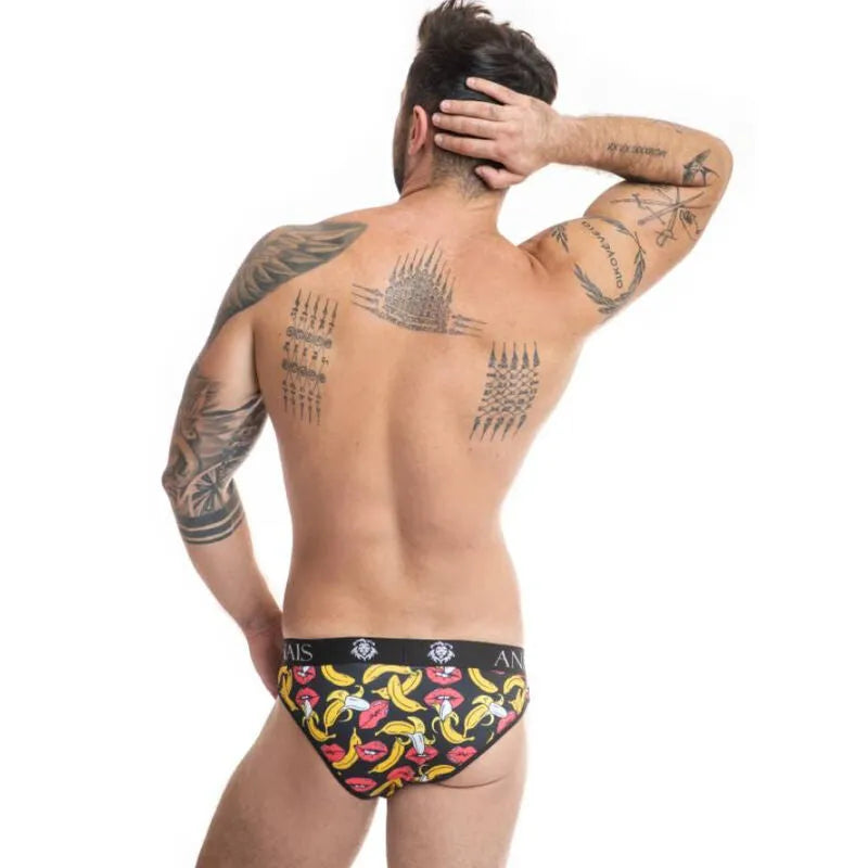 Slip homme imprimé bananes colorées, taille élastique noire, coupe ajustée, matière Lycra douce.