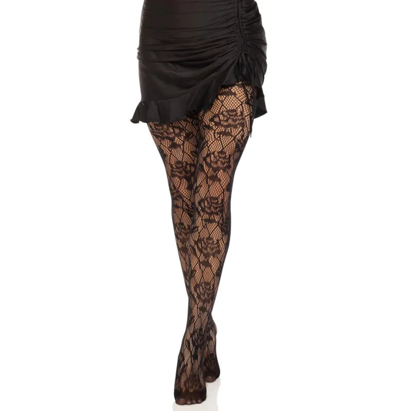 Collants résille noirs avec motifs roses sauvages, élégants et confortables, parfaits pour une tenue chic et romantique.