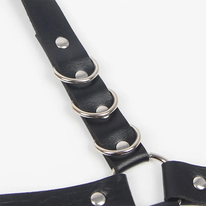 Harnais jarretières en cuir noir avec anneaux métalliques, design élégant et ajustable, signé Subblime pour séduction raff...