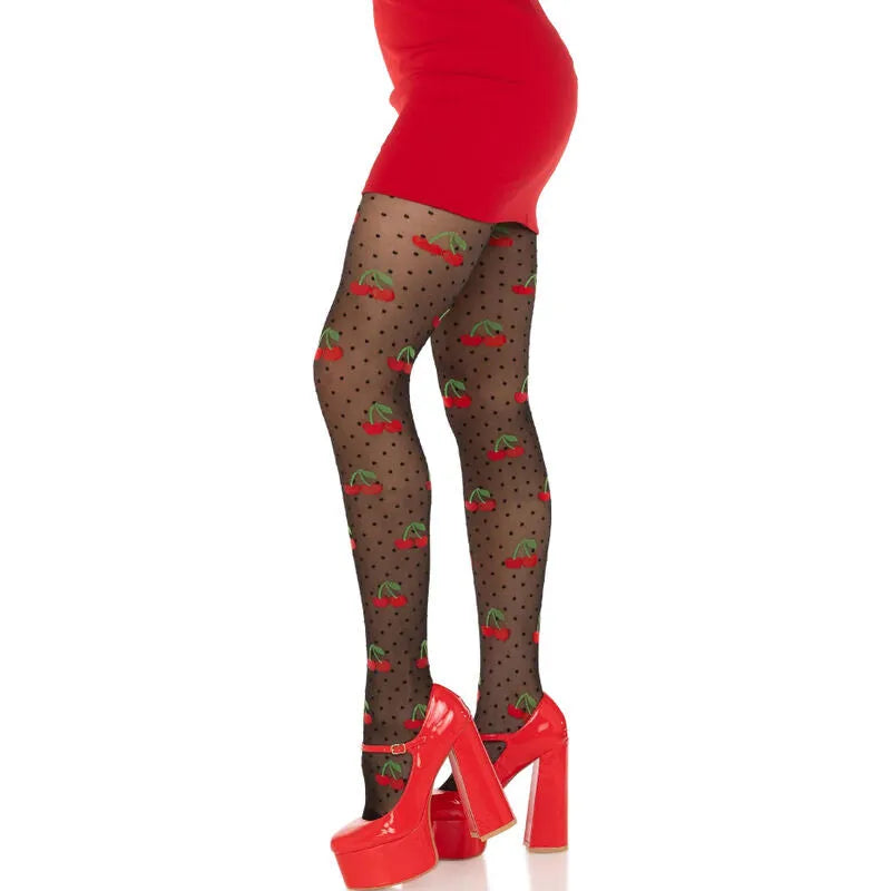 Collants noirs transparents à pois et motifs cerises, style rétro rockabilly, portés avec jupe rouge et talons hauts.