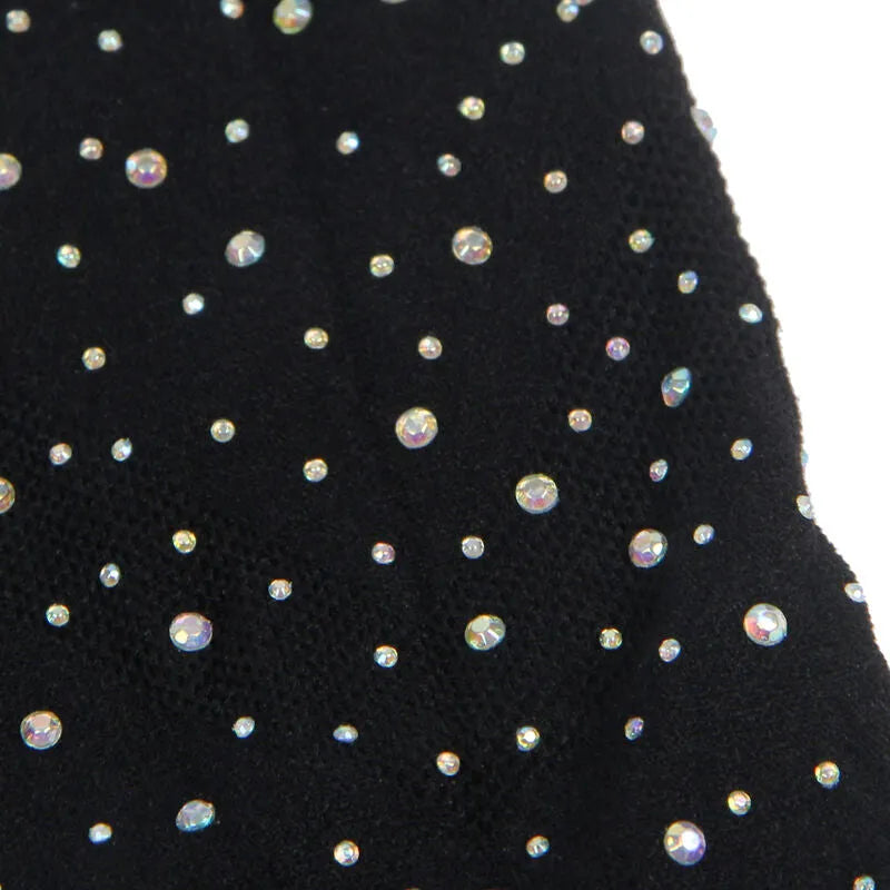Body moulant noir résille avec paillettes et strass, élégant et sensuel, idéal pour soirées glamour et occasions spéciales.