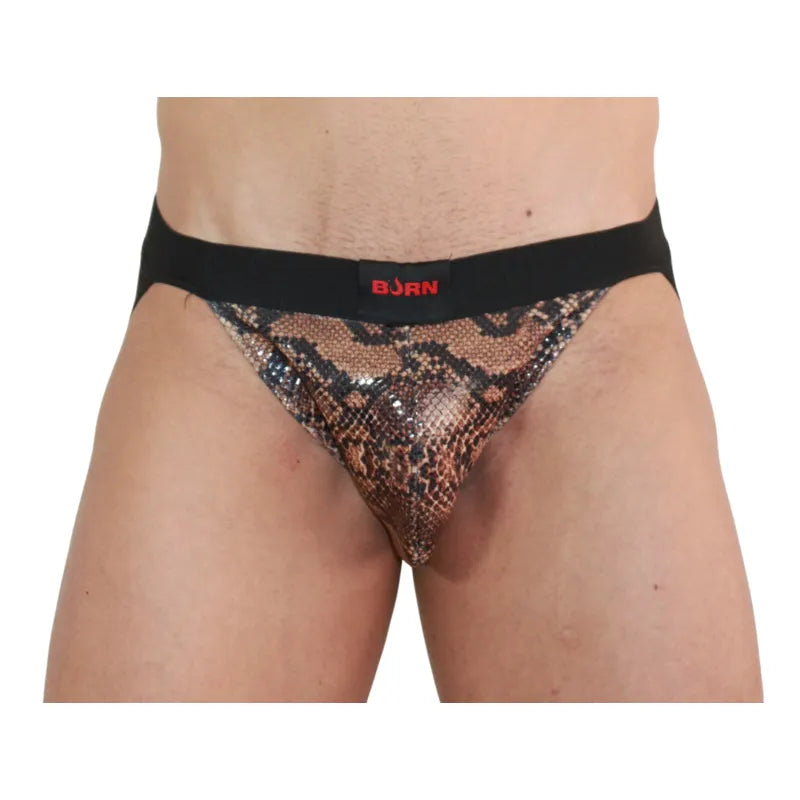 Jockstrap BURN noir en matériaux premium, design audacieux avec paillettes et transparences séduisantes.