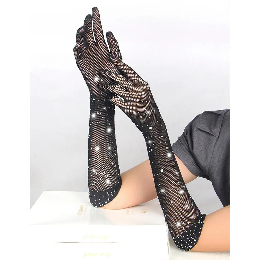 Gants noirs pailletés strassés élégants, longs et transparents, apportant une touche de luxe et sophistication.