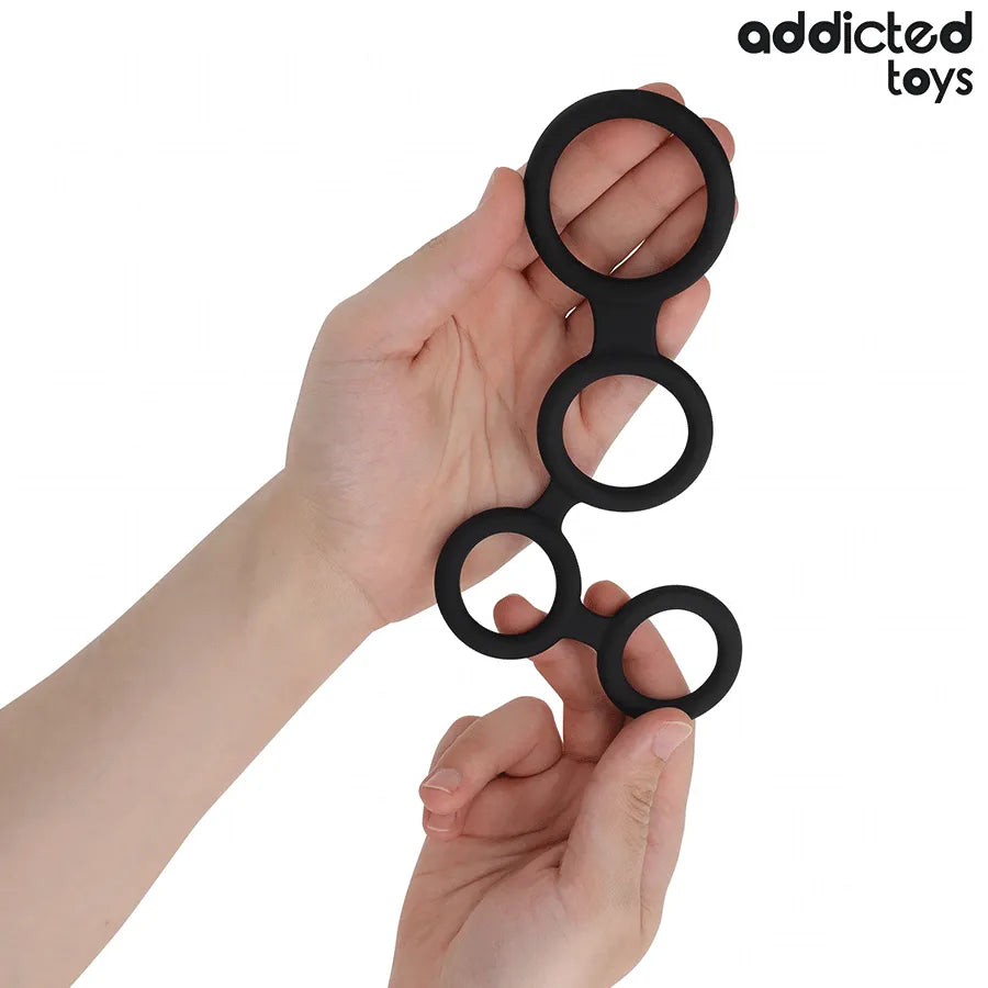 Anneau pénien noir en silicone avec séparateurs testicules, ergonomique, ajustable, pour stimulation et érection prolongée.