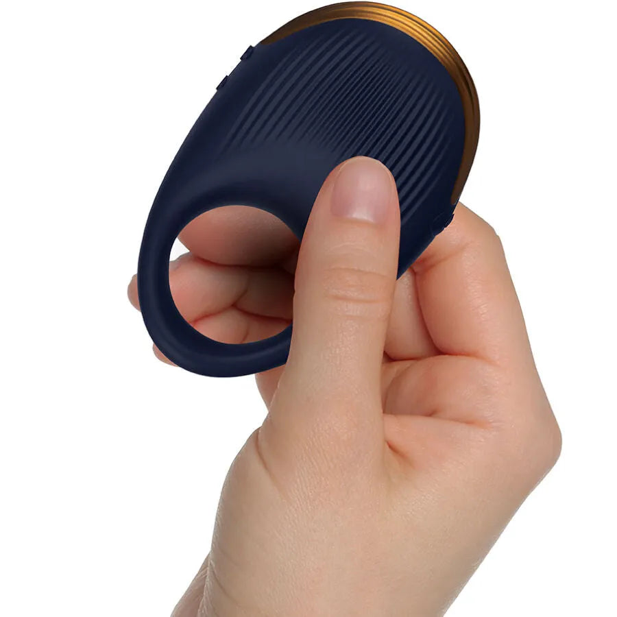 Anneau vibrant bleu en silicone médical strié, ergonomique, tenu en main, pour stimulation intime, 10 vitesses, étanche.