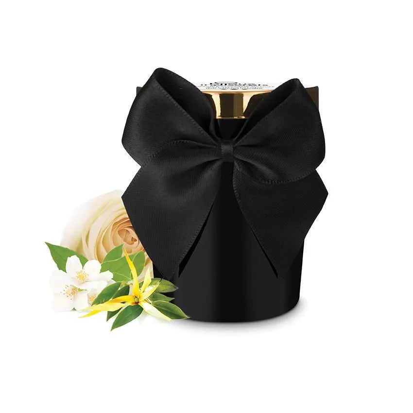 Bougie de massage noire avec nœud noir, couvercle doré, fleurs de rose, ylang-ylang et jasmin, édition romantique.