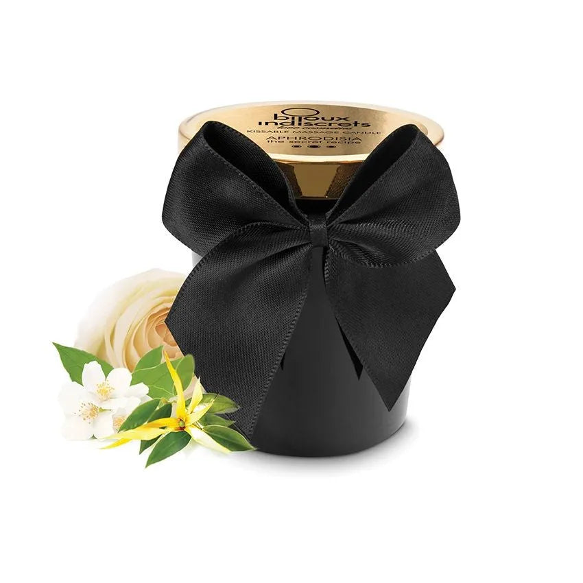 Bougie de massage noire avec couvercle doré, nœud noir, parfum rose ylang-ylang jasmin, ambiance romantique.