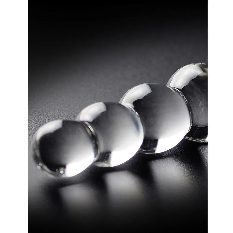 massageur verre soufflé hypoallergénique stimulation anale progressive sphères graduées insertion confortable surface lisse transparent chauffable refroidissable durable hygiénique discret élégant