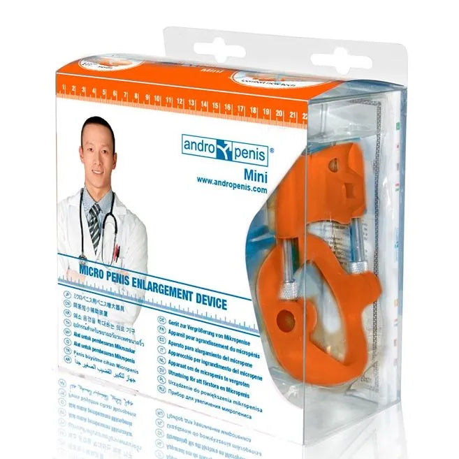 Appareil médical Andropenis Mini orange en plastique, emballage transparent, pour agrandissement pénis masculin.