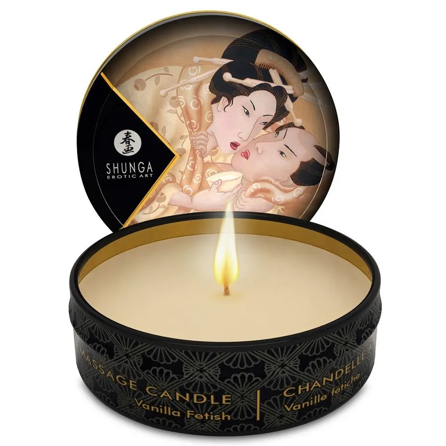 Bougie de massage Shunga, arômes chocolat vanille thé vert, design japonais, boîte ronde noire, flamme allumée.