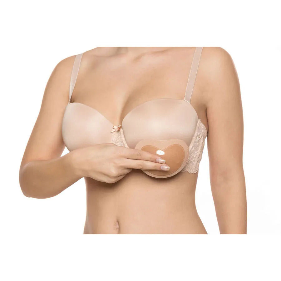Coussinets adhésifs invisibles en gel beige, forme ergonomique, pour soutien-gorge, offrant maintien et galbe naturel.