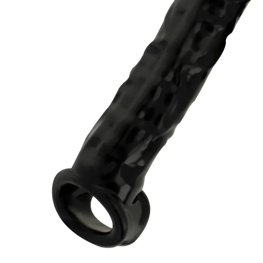 Étui pénis noir en élastomère, souple et durable, avec anneau testicules, allongement 2,5 cm, stimulation optimale.